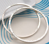 Chunky Silver Narrative Bangle
